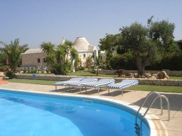 Гостевой дом Trulli Fogliarella Остуни Экстерьер фото